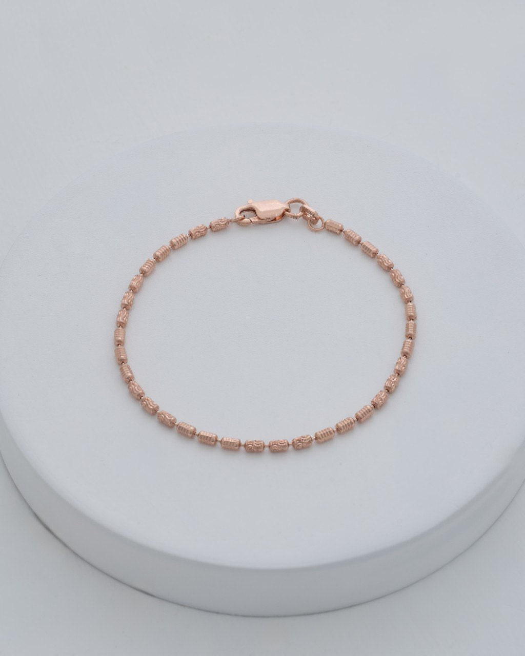 PULSERA ROSADA TUBO 16CM