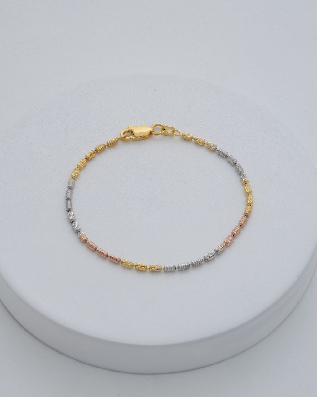 PULSERA BARRIL TRES TONOS 16CM